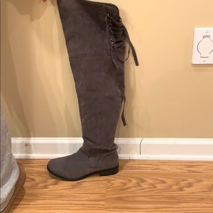 Thigh high gray boots with tie back